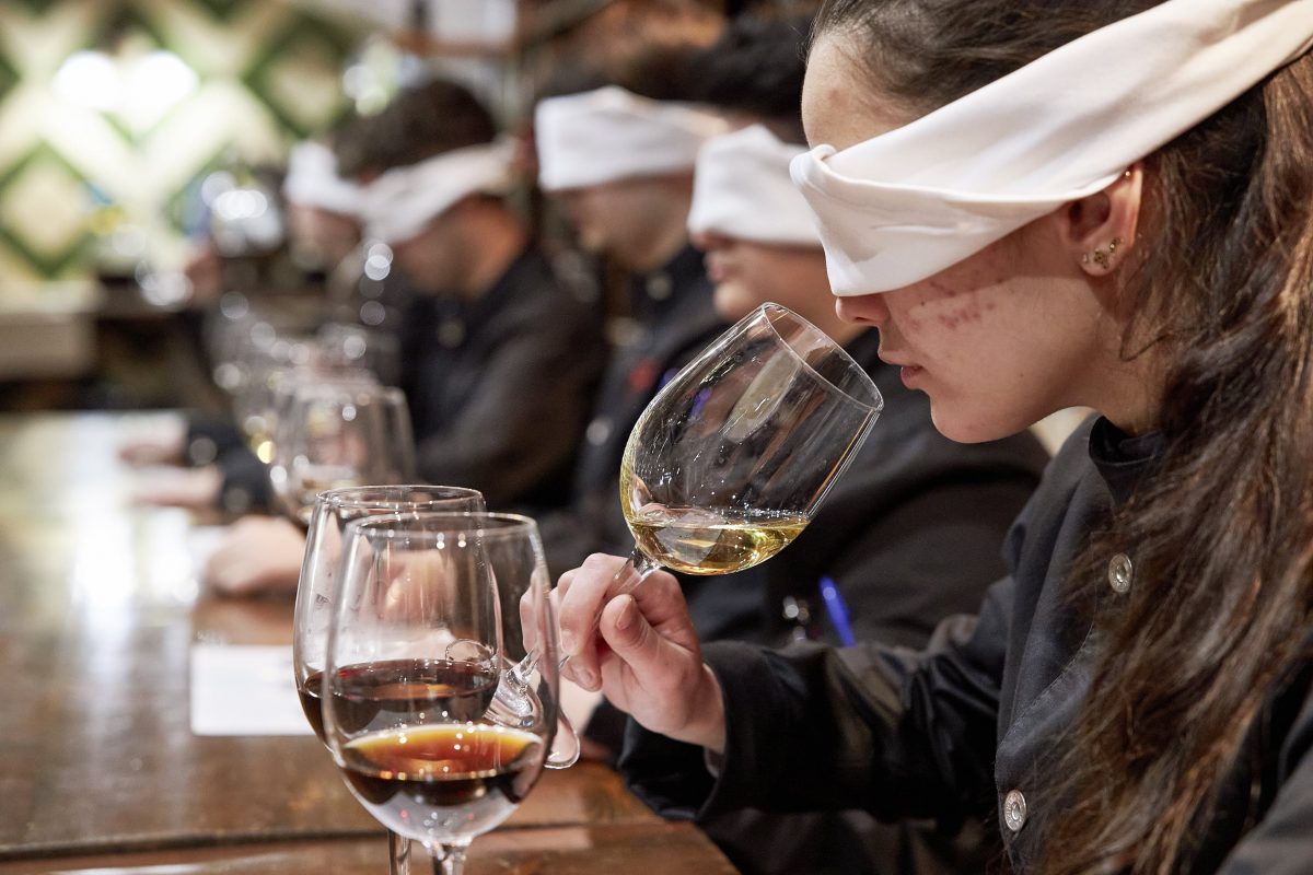 Student exercising smell in wine tasting